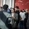 Symposium participants discussing their projects at poster session