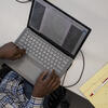 student using laptop